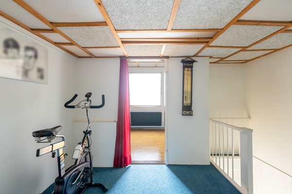 Foto - Te koop: tussenwoning gelegen aan groenvoorziening